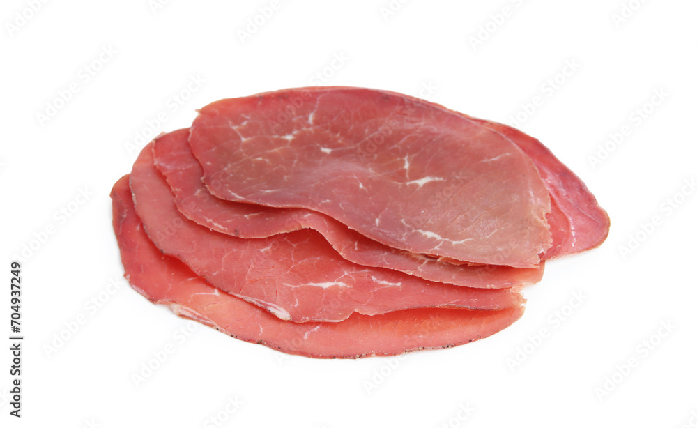 Slices of tasty bresaola isolated on white Slices of tasty bresaola isolated on white