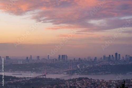 Fotomurale Istanbul Bosphorus Bridge at sunset and evening lights with colorful clouds in t