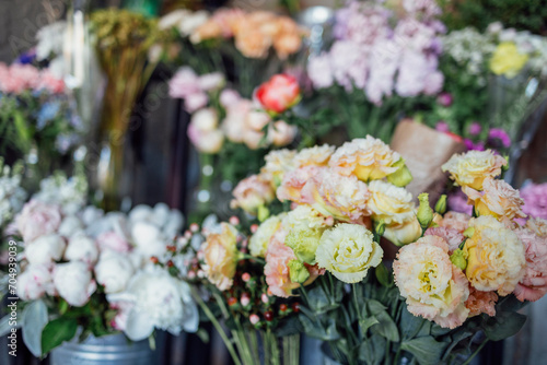 Showcase of a flower shop with large assortment in retro style