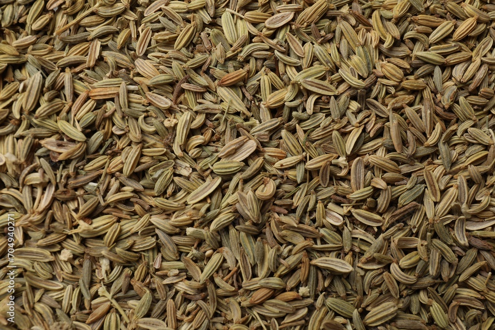 Many fennel seeds as background, top view Many fennel seeds as background, top view