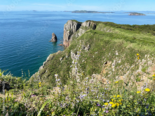 The beautiful Southeastern coast of the island of Shkota in August in sunny weather. Russia, Vladivostok city photo