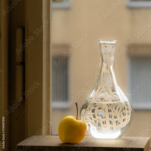 Vase and apple