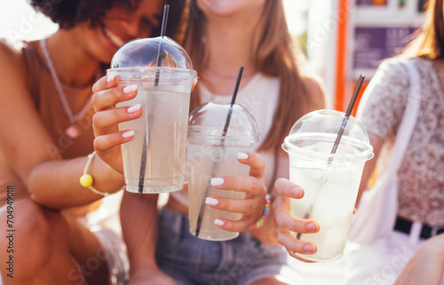 Wallpaper Mural Close up of three teenage girls in casual clothes drinking tasty lemonade on the go Torontodigital.ca