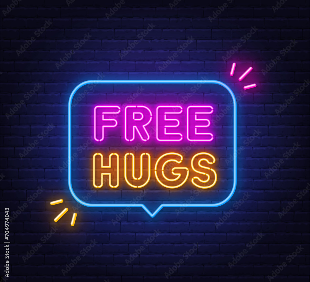 Free Hugs neon sign in the speech bubble on brick wall background.