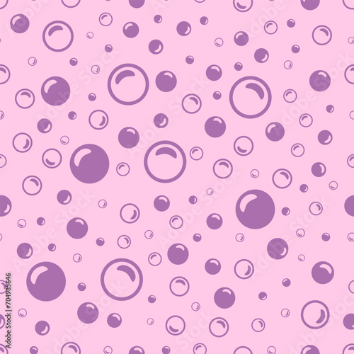purple soap bubbles on a light pink background