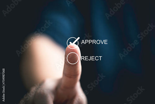 Businessman hand touching to correct sign symbol mark on approve box for document approval and project acceptance concept.
