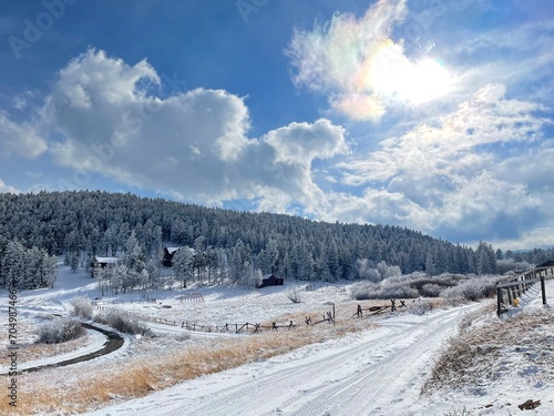 rustic farm in the winter in the Colorado Rocky Mountains - rural scenery landscape