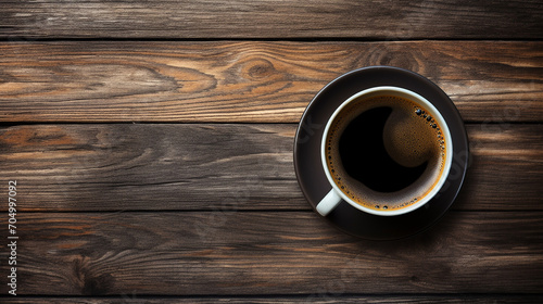 black coffee cup on old wooden table top view