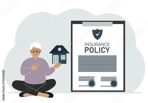 A man holds in his hands at home next to a large insurance contract. Home and real estate insurance concept.