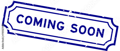 Grunge blue coming soon word rubber seal stamp on white background