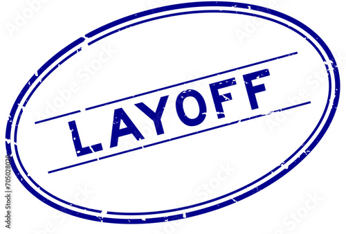 Grunge blue layoff word oval rubber stamp in white background