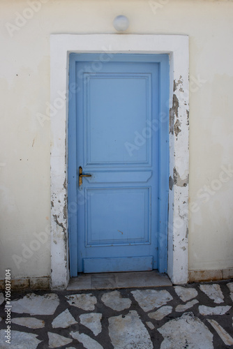 Blue wooden closed door, Corfu, Greece