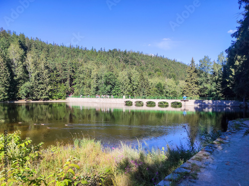 View to Dam on the Lomnica River, semicircular dam with five overflows in Karpacz, Poland