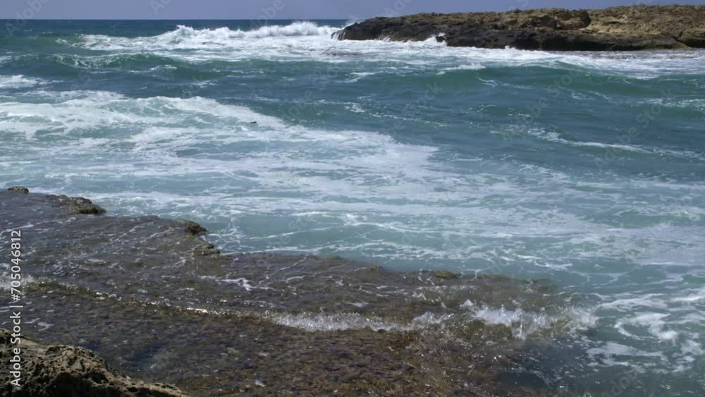 Mediterranean coast, waves reaching beach rocks Mediterranean coast, waves reaching beach rocks