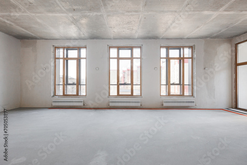 interior of the apartment without decoration in gray colors. rough finish