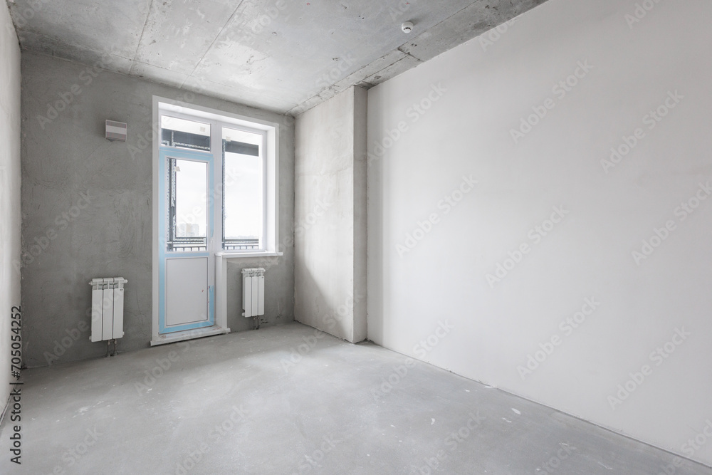 interior of the apartment without decoration in gray colors. rough finish interior of the apartment without decoration in gray colors. rough finish
