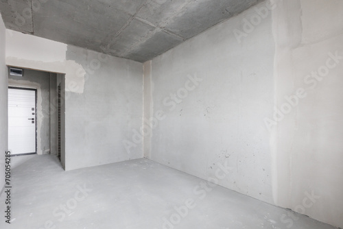 Wallpaper Mural interior of the apartment without decoration in gray colors. rough finish Torontodigital.ca