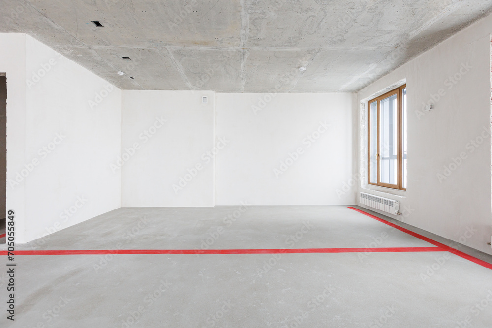 interior of the apartment without decoration in gray colors. rough finish interior of the apartment without decoration in gray colors. rough finish