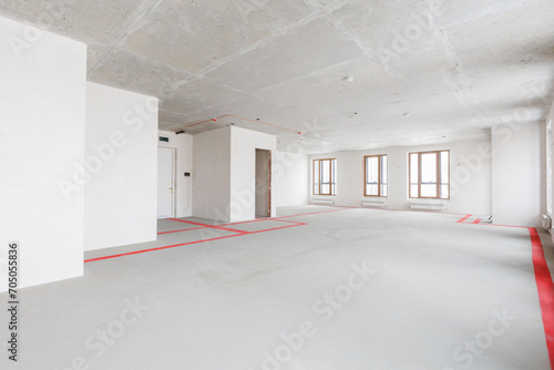 interior of the apartment without decoration in gray colors. rough finish