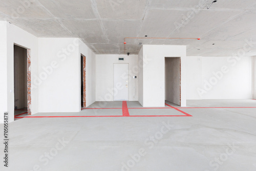 interior of the apartment without decoration in gray colors. rough finish