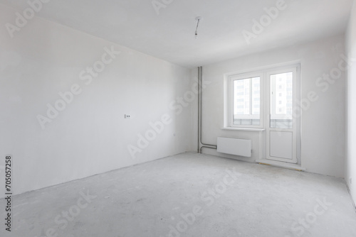 interior of the apartment without decoration in gray colors. rough finish