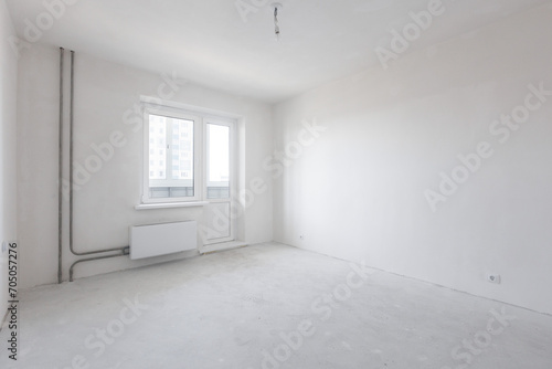 interior of the apartment without decoration in gray colors. rough finish