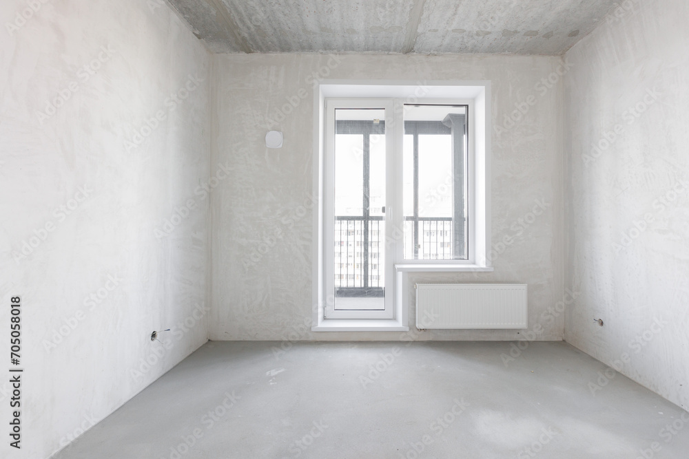 interior of the apartment without decoration in gray colors. rough finish interior of the apartment without decoration in gray colors. rough finish