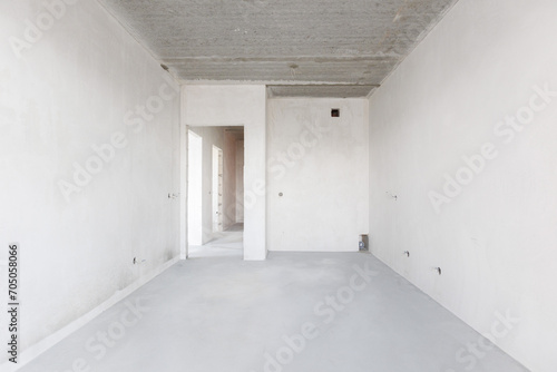 interior of the apartment without decoration in gray colors. rough finish