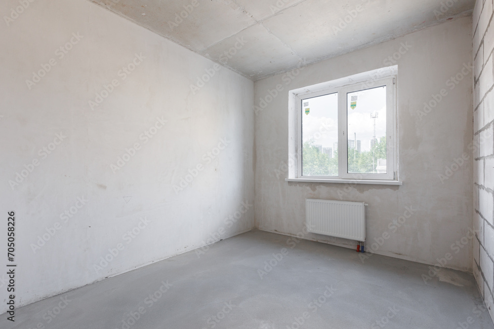 interior of the apartment without decoration in gray colors. rough finish interior of the apartment without decoration in gray colors. rough finish