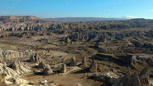 Captivating aerial view of Cappadocia, revealing its otherworldly landscapes with fairy chimneys and ancient caves.
