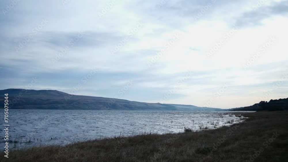 morning panorama of a lake surrounded by hills morning panorama of a lake surrounded by hills