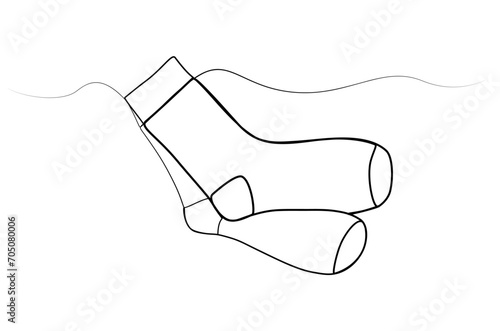 continuous one line drawing of socks. vector