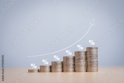 Financial interest rates hike, dividends and mortgage rates increase. Stacked coins with percentages and arrow pointing up icon. Inflation, sale cost, tax, and dollar exchange rate rise concept.