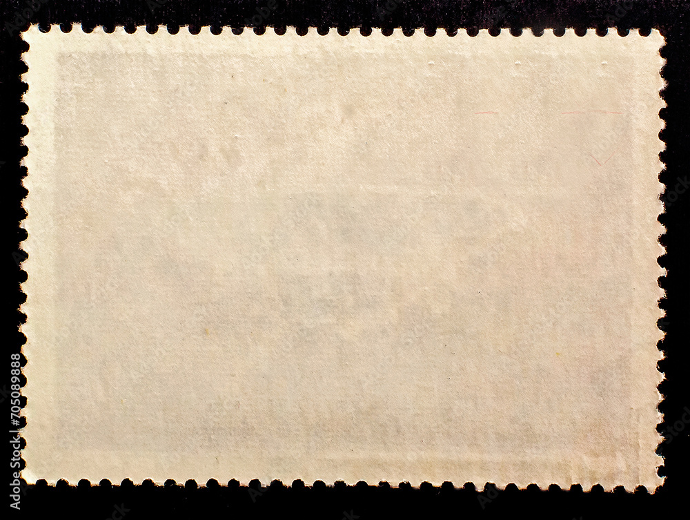 Blank aged postage stamp isolated on black background. Texture of paper. Template for graphic designers	
