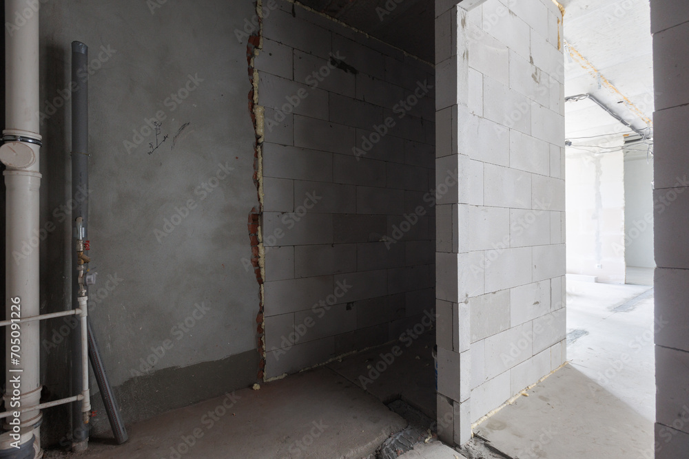 interior of the apartment without decoration in gray colors. rough finish interior of the apartment without decoration in gray colors. rough finish