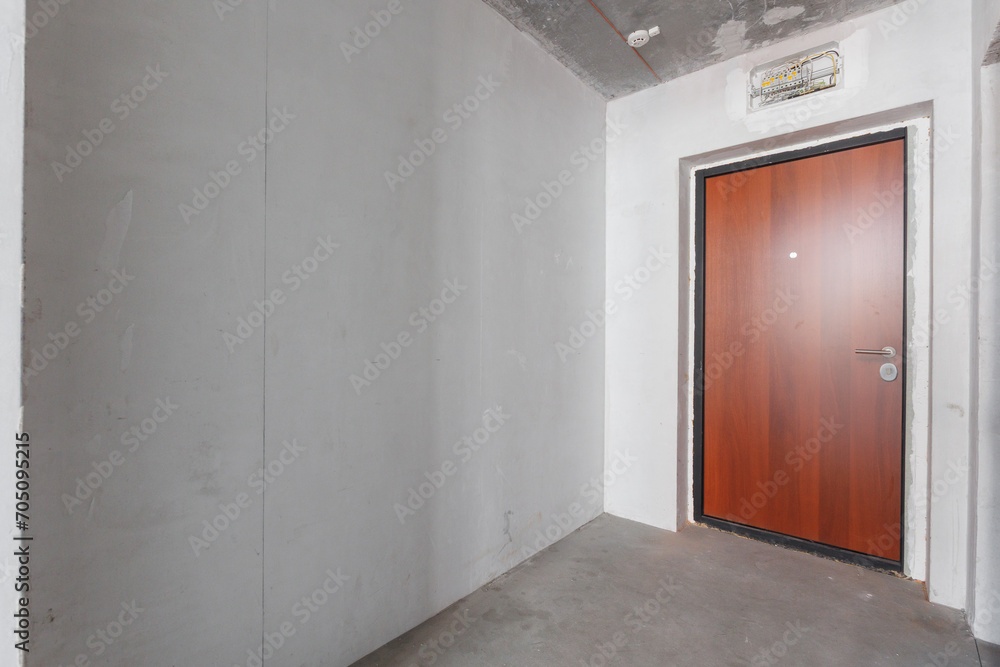 interior of the apartment without decoration in gray colors. rough finish interior of the apartment without decoration in gray colors. rough finish