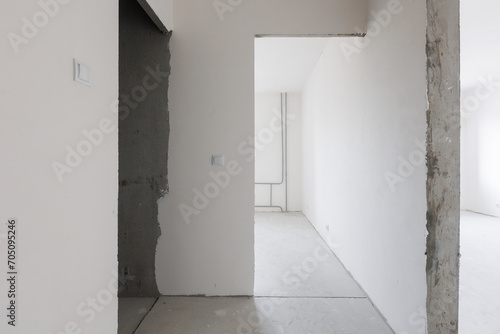 interior of the apartment without decoration in gray colors. rough finish