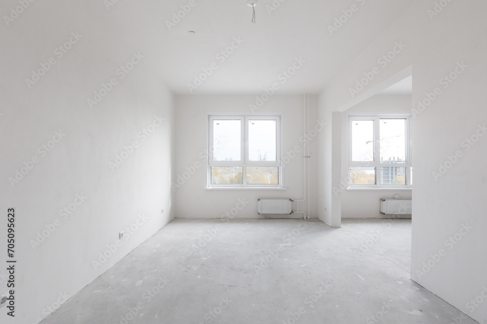 interior of the apartment without decoration in gray colors. rough finish interior of the apartment without decoration in gray colors. rough finish