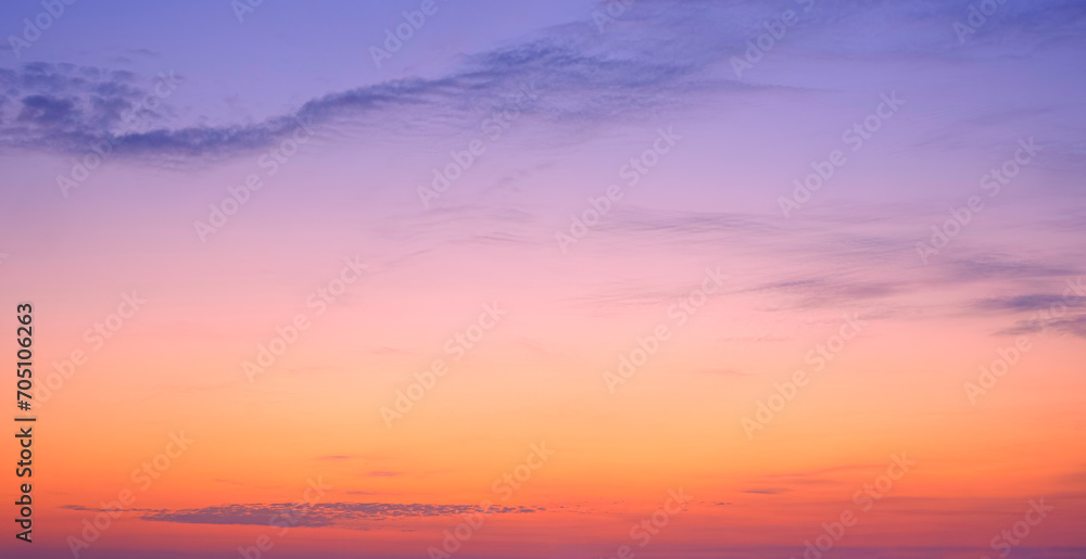 Evening sky with colorful sunlight and dark fluffy clouds on beautiful sunset sky twilight background, Idyllic natural tranquil scene