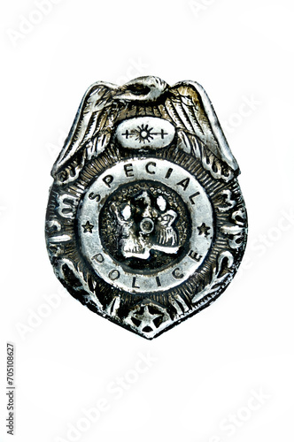 Old police badge isolated on a white background