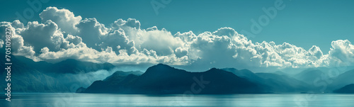 Blue sky with mountain scenery and calm sea