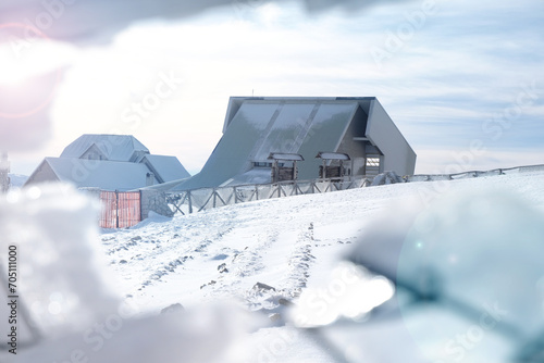 Sunny day in snowy mountains with houses  Campo Imperatore  Gran Sasso Italy