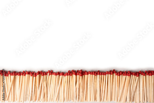 Boxes with new matchsticks isolated on a background. © Nikolay