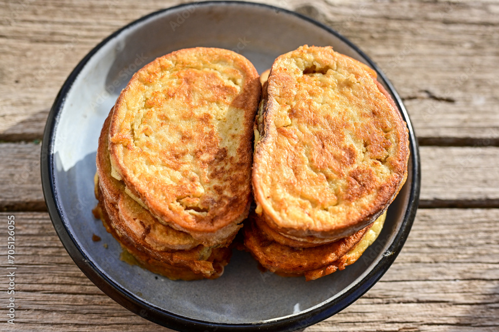 French toast and white cheese. Rustic breakfast made from deep fried bread with organic free range eggs French toast and white cheese. Rustic breakfast made from deep fried bread with organic free range eggs