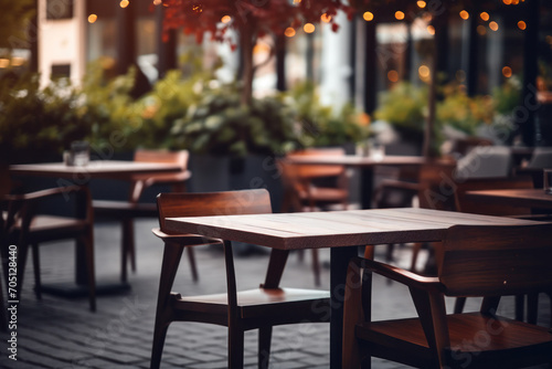 Empty table in an outdoor cafe on a city street  showing elegant wooden furniture and vintage atmosphere.