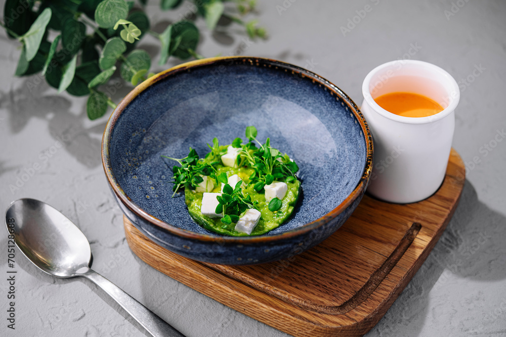 Broccoli, spinach cream soup in a bowl Broccoli, spinach cream soup in a bowl