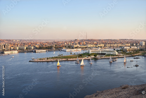 Sunset over the Nile River in the city of Aswan with sandy and deserted shores