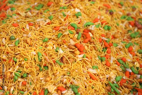 фотографія Traditional spicy bombay mixture in indian street shop