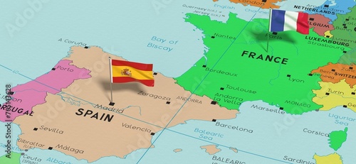 France and Spain - pin flags on political map - 3D illustration