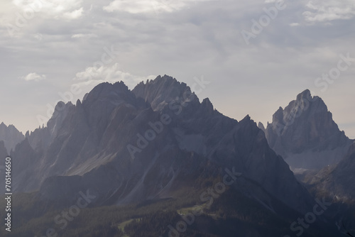 Scenic view Elferkofel and Zwoelferkofel in majestic mountain range of Sexten Dolomites, South Tyrol, Italy, Europe. Hiking concept in Italian Alps. Looking from top lift station of Helmjet Sexten photo